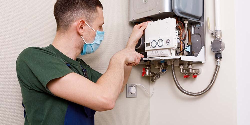 tankless water heater being installed